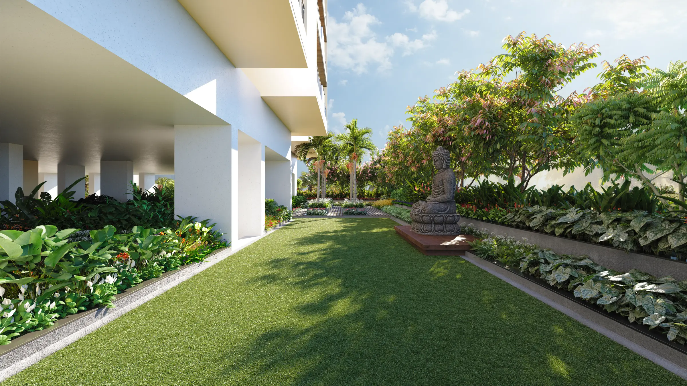 Podium garden lawn beside the tower, a seated Buddha among the planting